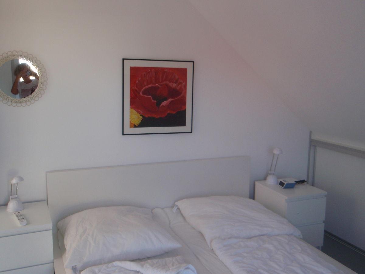 Schlafzimmer mit tv im oder rund um Haus Mirabelle