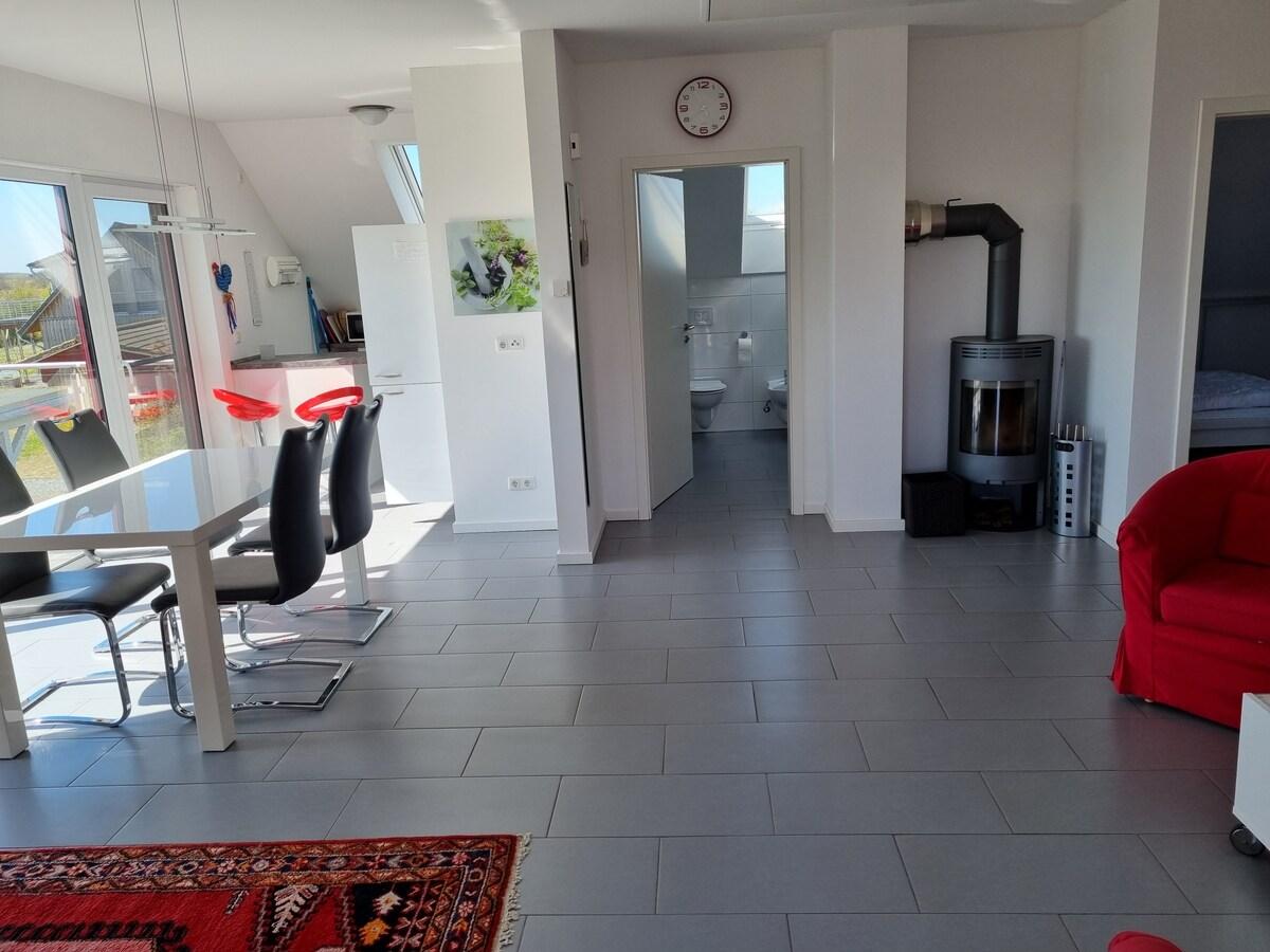 Wohnbereich kamin im oder rund um Haus Mirabelle